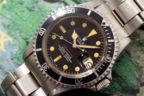 rolex 1680 red watch.